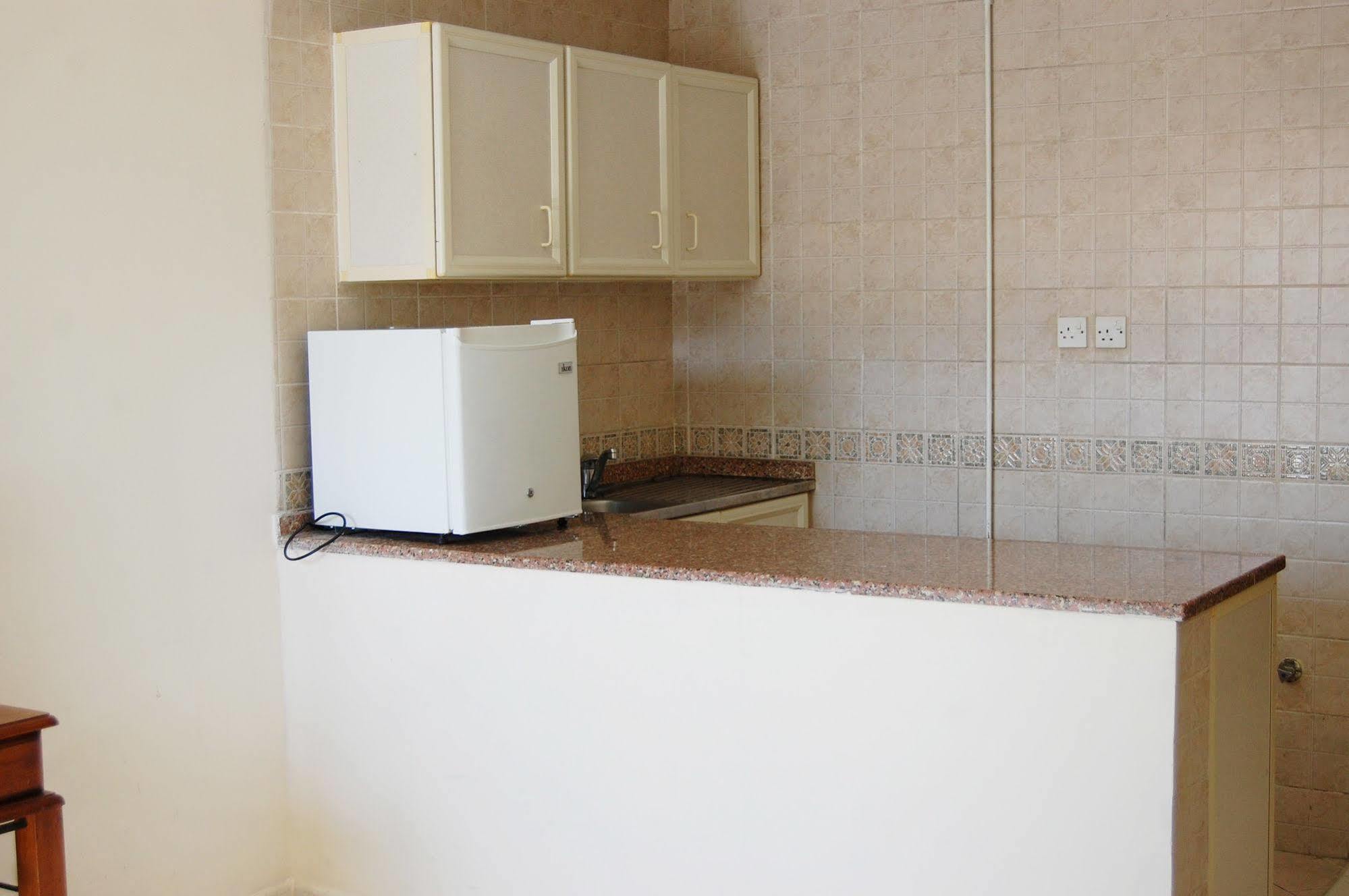 Al Ferdous Hotel Apartment Charjah Extérieur photo